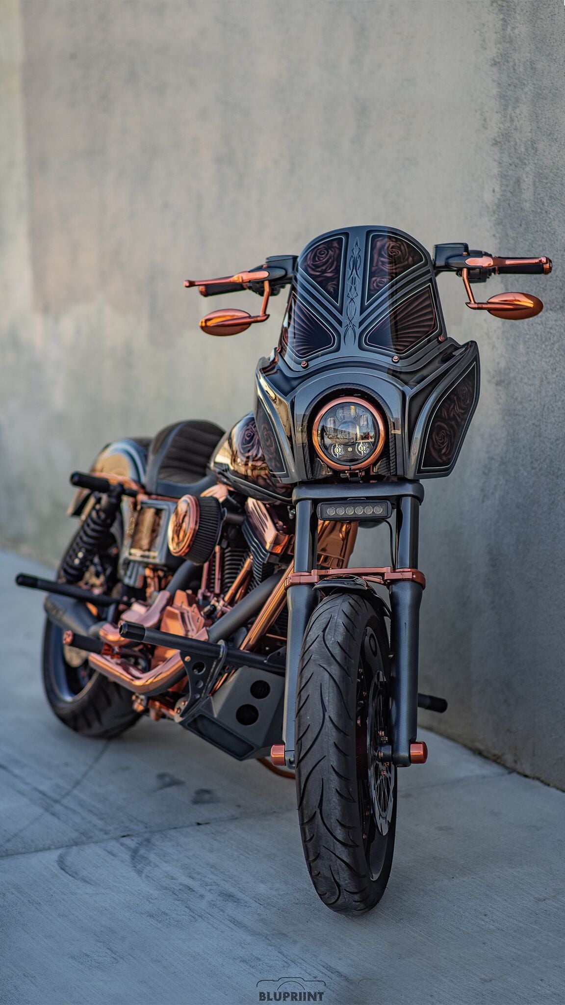 Custom motorcycle with copper accents, photographed by BLUPRINT